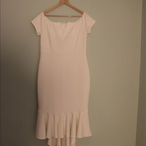 White dress with trail skirt.